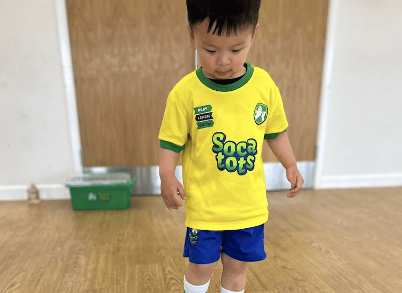 Toddler activities. Image shows a toddler in a Socatots kit.