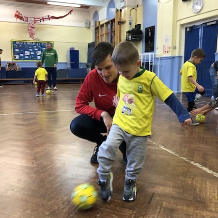 Coach Joe with Socatots boy