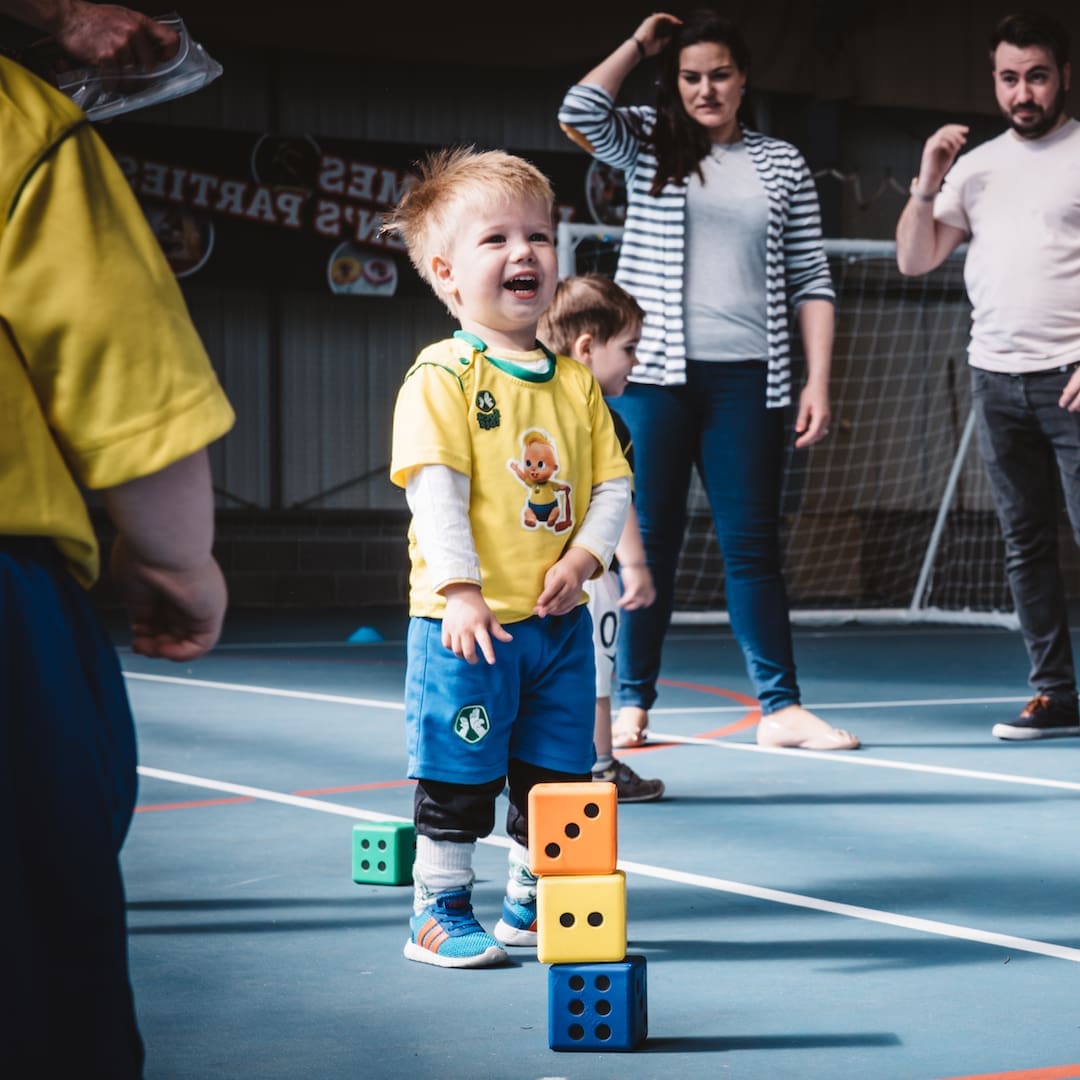 boy pointing at dice