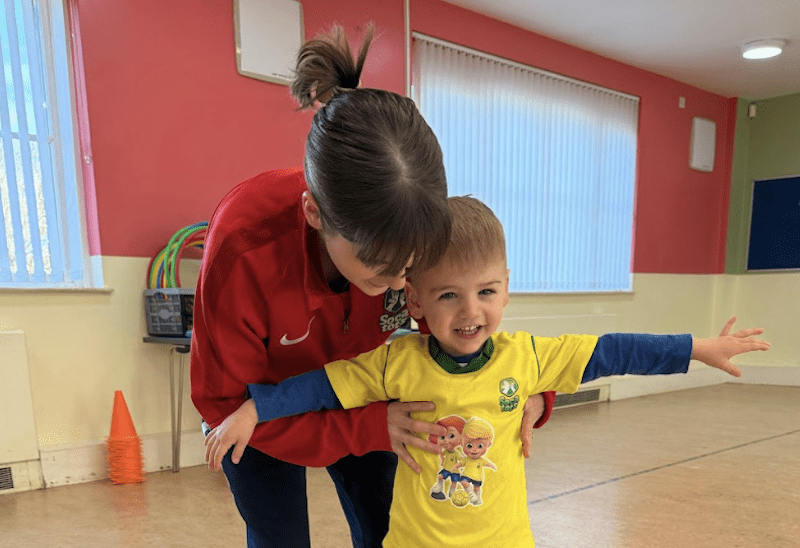 Toddler football classes in Sunderland. Image shows a toddler balancing in their Socatots kit.